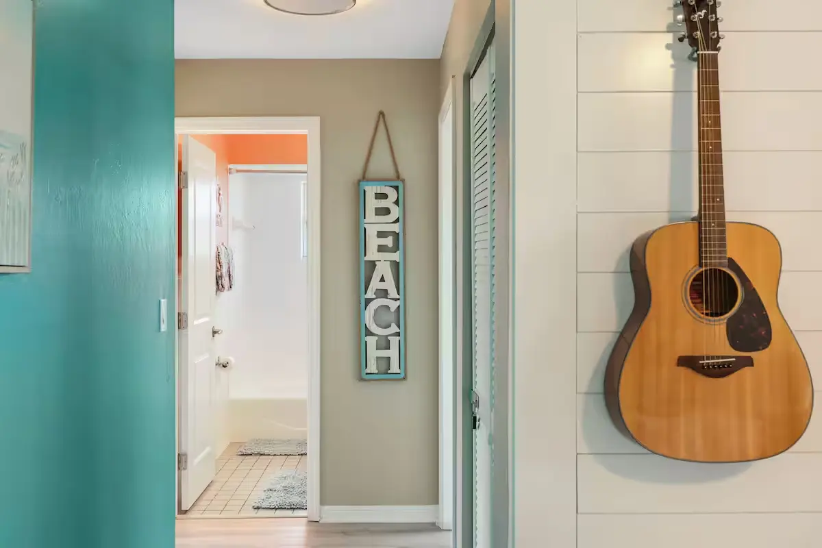 Hallway with guitar and beach decor