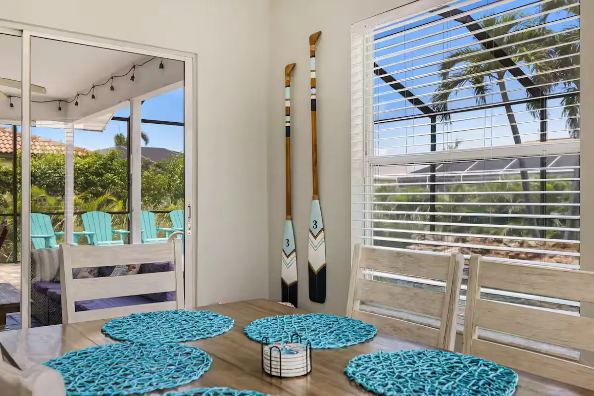 Outdoor seating on the screened lanai