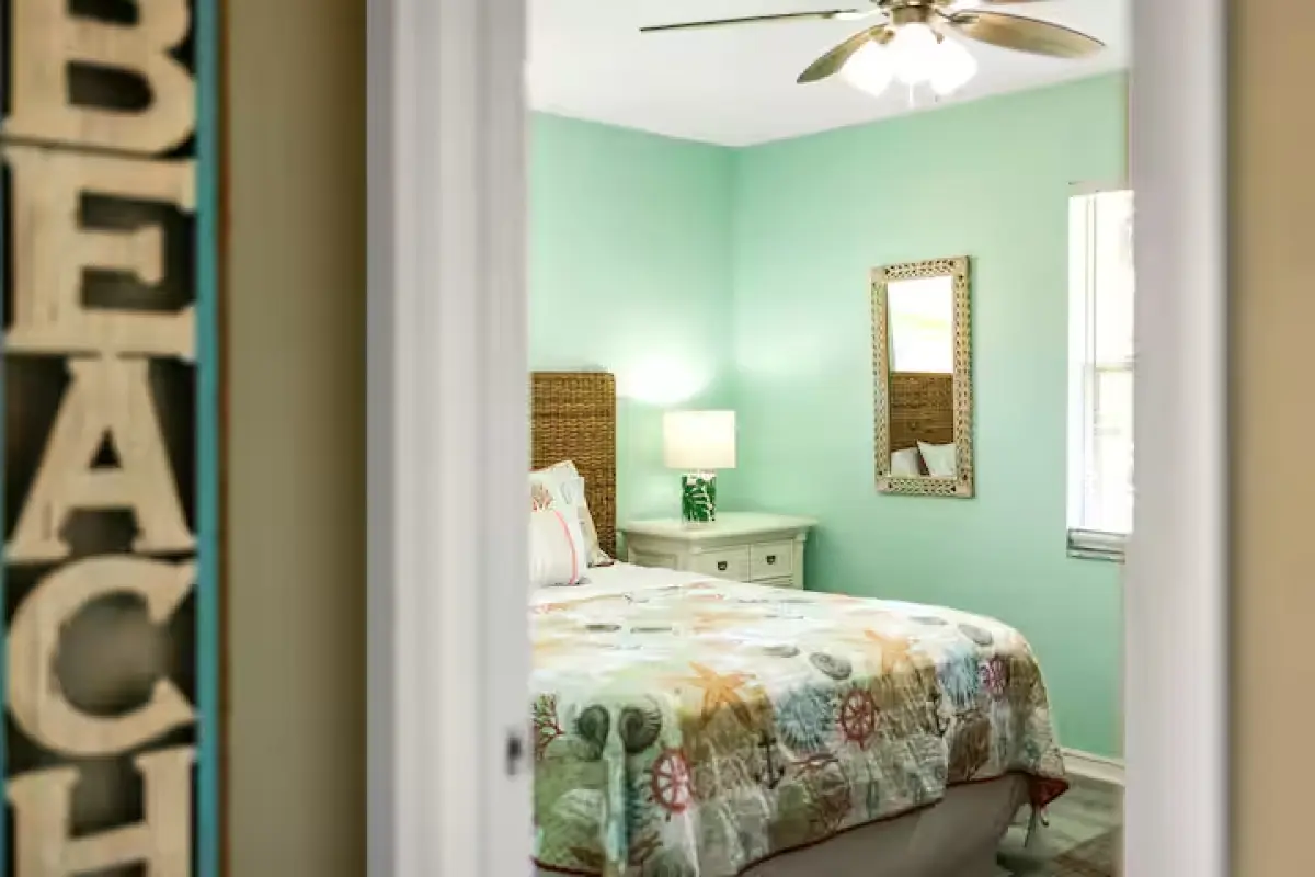 Bedroom with BEACH letters decor