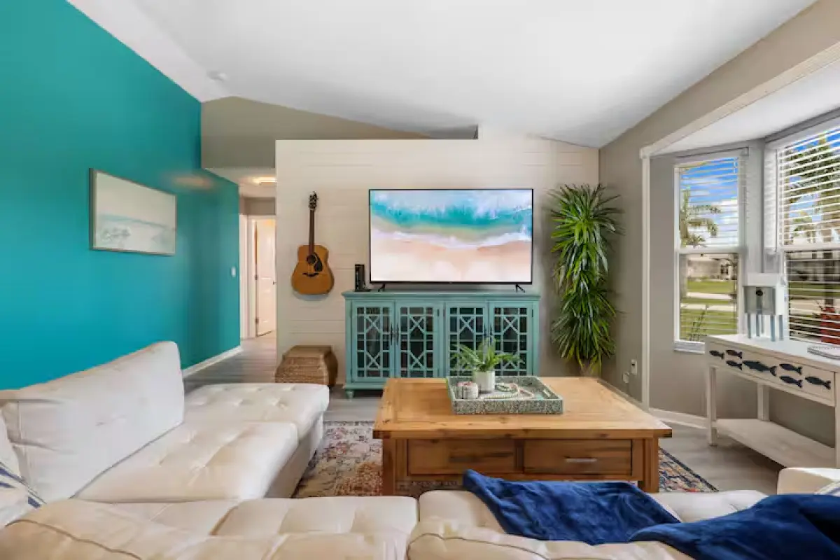 Living room with sectional sofa and TV