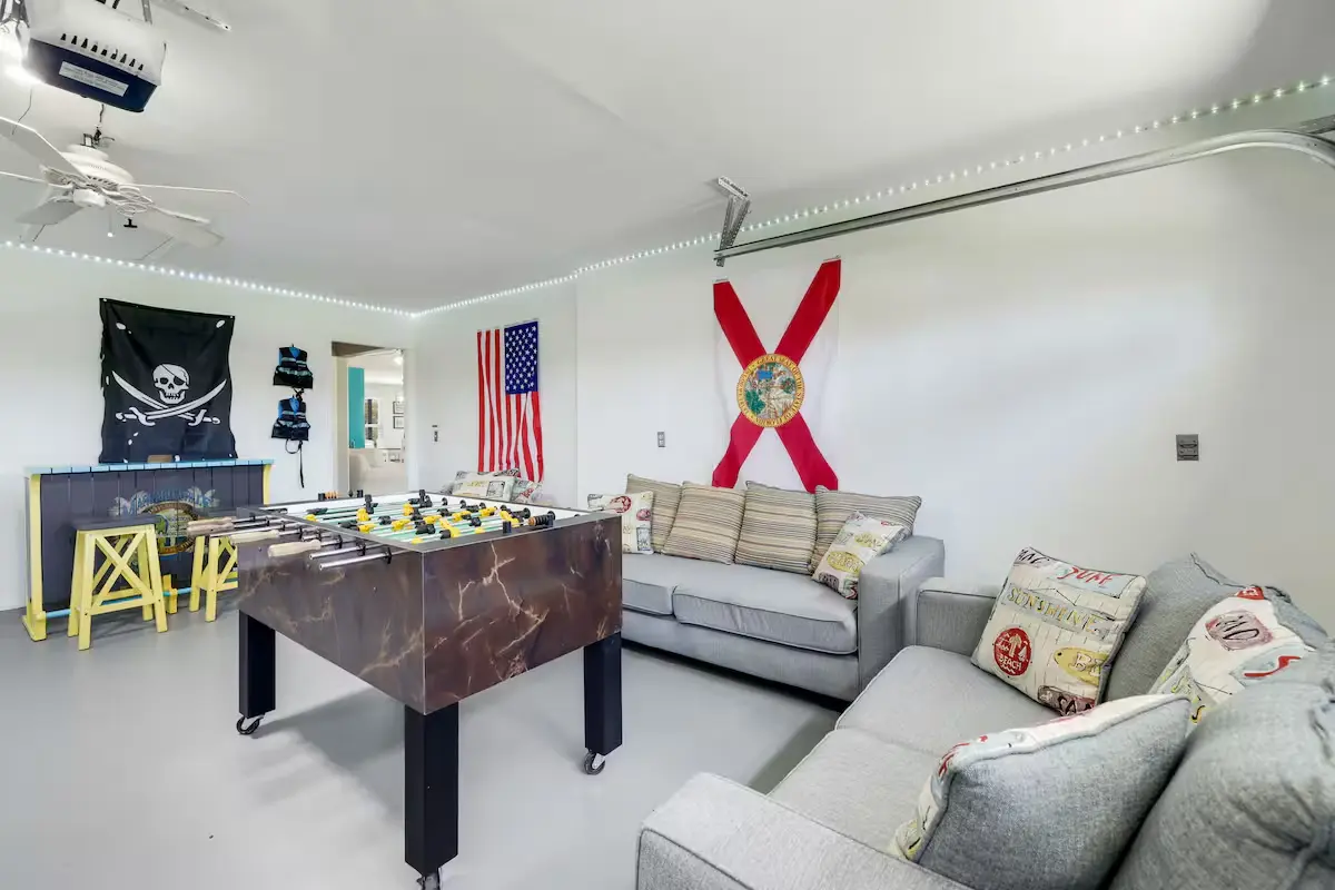 Game room with ping-pong table and darts